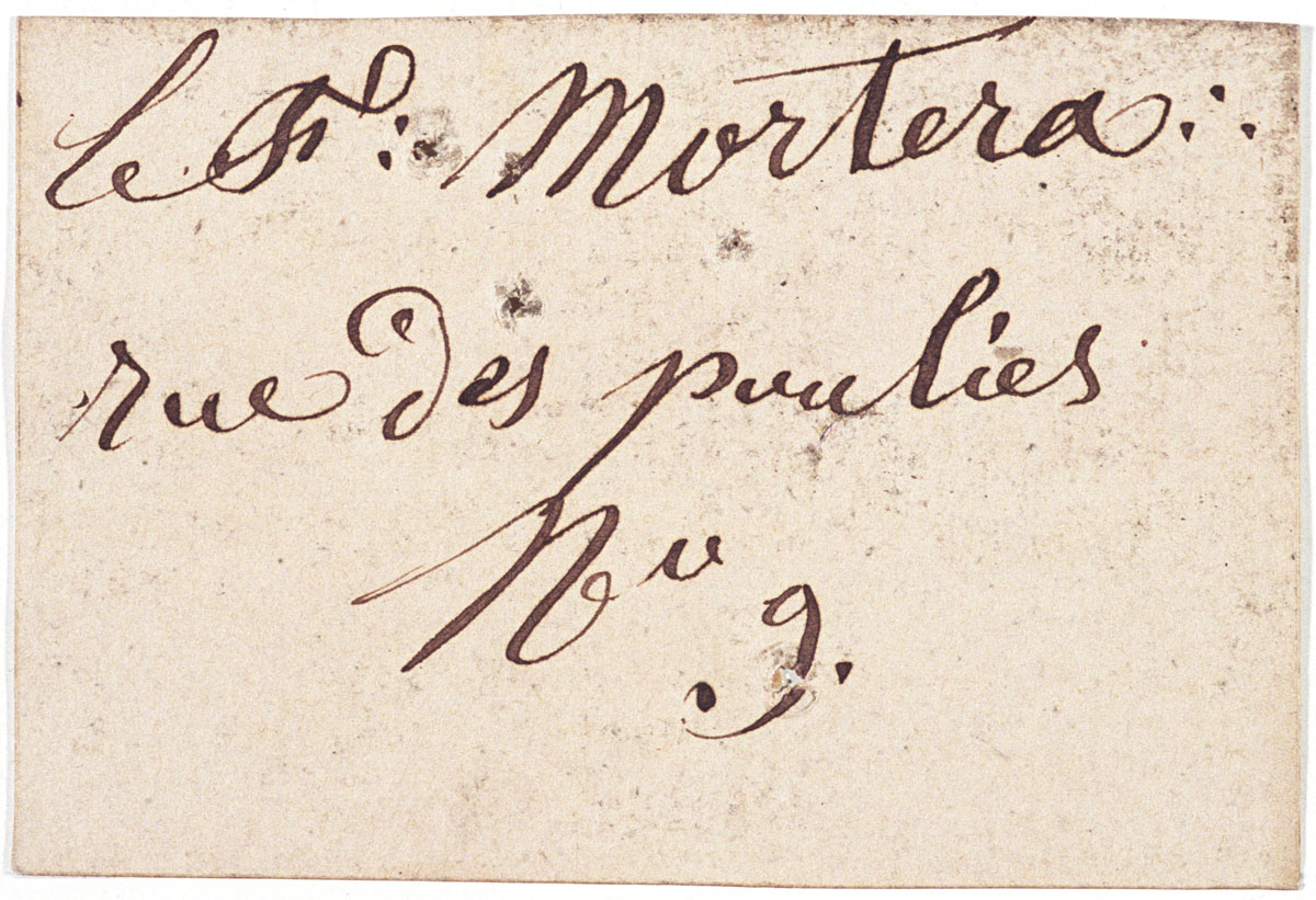 Le verso de la carte porte une inscription manuscrite à l'encre.
